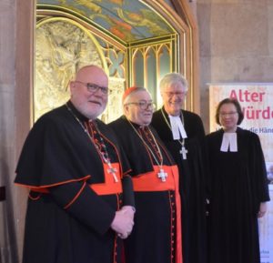 Man versteht sich: Kardinäle Marx und Lehmann mit EKD-Präses Bedford-Strohm