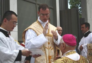 Fr.-Kenneth-Walker-blesses-Bishop-Bruskewitz-2012