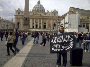 Islamist mit schwarzer Fahne auf dem Petersplatz